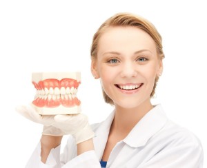A female dentist with dentures