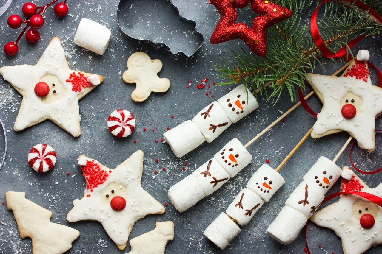 Star-shaped Santa cookies, snowmen made out of marshmallows, and peppermint candies.